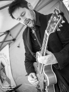 Those Deadbeat Cats playing some rockabilly in North Walsham. Ron Sayer on guitar.