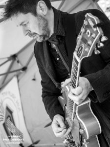 Those Deadbeat Cats playing some rockabilly in North Walsham. Ron Sayer on guitar.